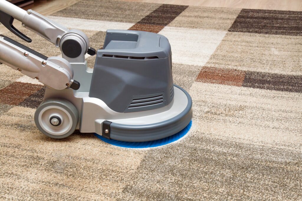 Professional carpet cleaning machine cleaning a carpet